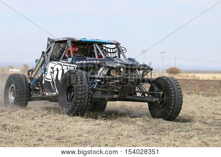 Forty Five Degree Close-up View Of Speeding Black Porter Rally Car
