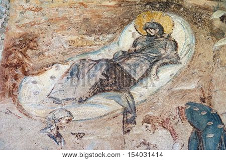 CASTELSEPRIO, ITALY - JUNE 25, 2016: The archeological area of Castelseprio (Varese Lombardy Italy): ruins of a village destroyed in the 13th century. Unesco World Heritage Site. The church mural paintings.