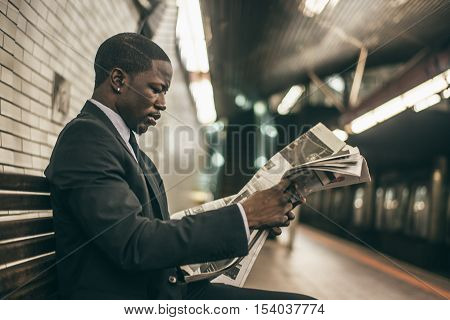 Businessman in full suit in New York subway metro