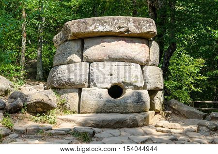 Dolmen single-chamber megalithic tomb of the Middle Bronze Age (3000-2000 BC). Valley of Zhane River near the village Vozrozhdenie in the vicinity of the resort city of Gelendzhik. Western Caucasus Krasnodar region of Russia.