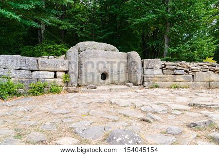 Dolmen single-chamber megalithic tomb of the Middle Bronze Age (3000-2000 BC). Valley of Zhane River near the village Vozrozhdenie in the vicinity of the resort city of Gelendzhik. Western Caucasus Krasnodar region of Russia.