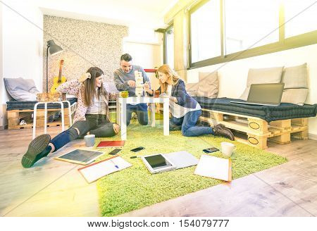 Young people employee workers having break in start up office - Human resources business concept with creative entrepreneurs on fun working game - Vintage lomo filter look with enhanced sun flare halo