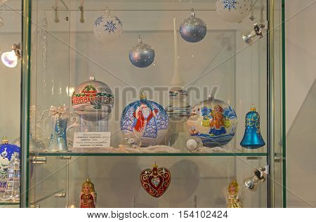 KLIN RUSSIA - JANUARY 16 2016: Museum of Christmas toys. Modern Christmas toys. Painting balls with winter landscape.