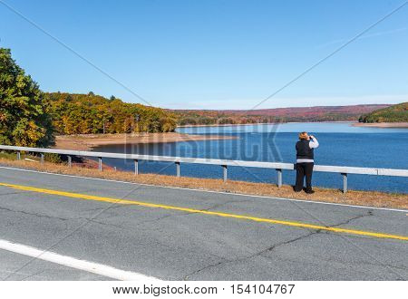 Liberty NY USA - Oct 15 2016. Fall foliage on the Neversink Reservoir in New York State's Catskill region