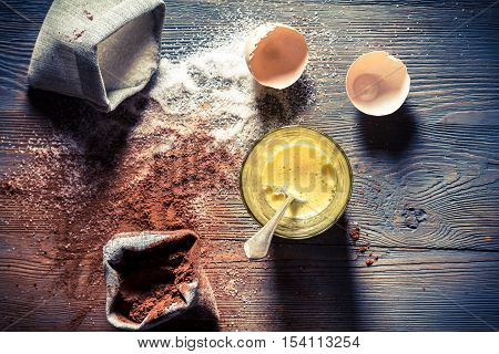 Ingredients for a simple dessert on old wooden table