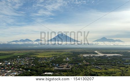 Yelizovo town and Avachinskaya group of volcanoes. View from the helicopter.