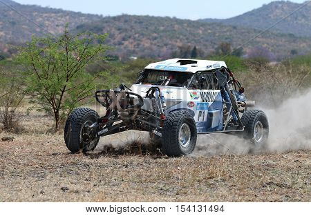 Forty Five Degree Close-up View Of Speeding White Zarco Rally Car