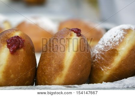 Preparation Of Donuts. The Filling And Powdered Sugar