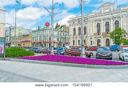 KHARKOV UKRAINE - MAY 20 2016: The city center decoated with colorful flowerbeds and trimmed trees on May 20 in Kharkov.