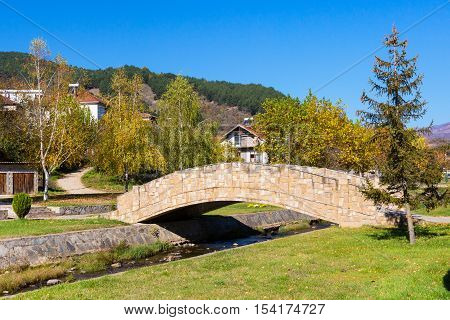 Bridge in Makedonska Kamenica town in Macedonia and autumn trees