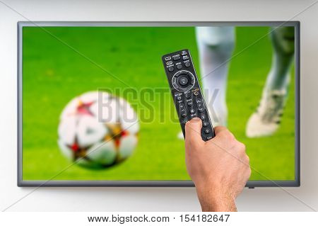 Man Is Watching Football Match On Tv