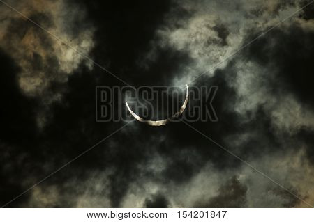 Solar eclipse in Kenya dark cloudy sky