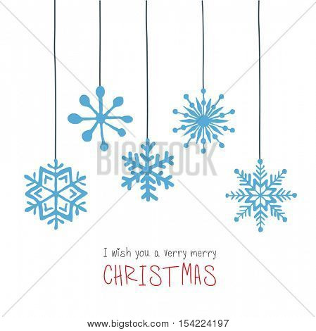 Christmas background with several hanging snowflakes