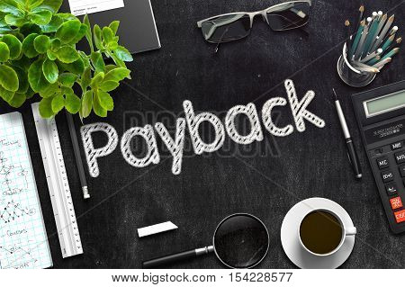 Payback Handwritten on Black Chalkboard. Top View of Black Office Desk with a Lot of Business and Office Supplies on It. 3d Rendering. Toned Image.