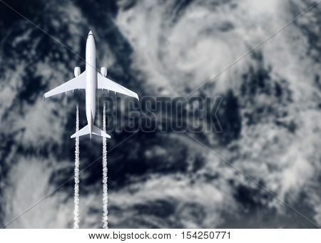 Top view of airplane passing hurricane - 3d illustration (Elements of this image furnished by NASA)