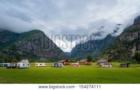 Panoramic view of camping at scenic mountain background. Eidfjord, Hordaland, Norway