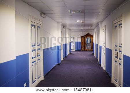 GENOA, ITALY - AUG 6, 2016: Interior of corridor in Hotel Mediterranee. Hotel Mediterranee is an 18th-century seafront building in the Pegli area of Genoa.