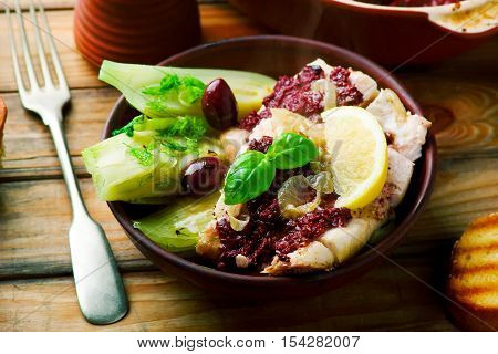 Cod with Olives and Fennel rustic style..seletive focus