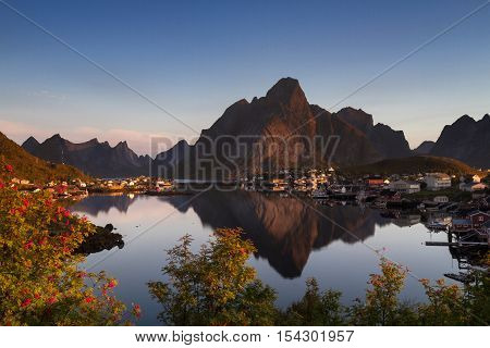 Village of Reine with mountain reflection Lofoten Norway