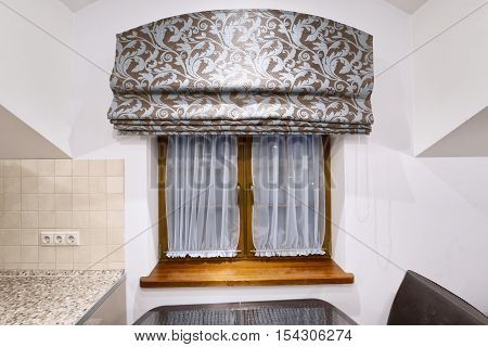Elegant interior design with luxurious curtains and tulle