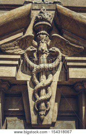 Carved Caduceus Symbol