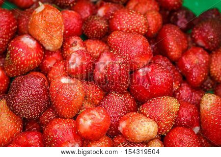 ripe berries of garden strawberry on a table