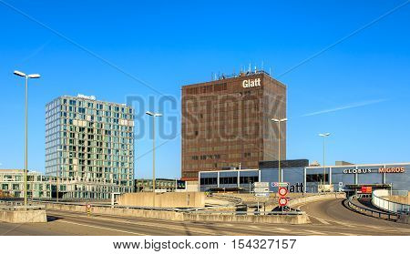 Wallisellen, Switzerland - 30 October, 2016: Allianz Suisse and Glatt Shopping Center buildings, view from the motorway bridge on Neue Winterthurerstrasse street. Wallisellen is a municipality in the Swiss canton of Zurich.