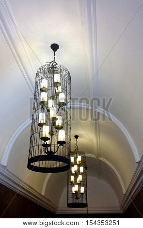 Beautiful ceiling hanging lamp in big cage