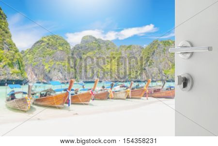 Opened White Door To Blurred Long Tail Boat On White Sand Beach At Maya Bay, Phi Phi Leh Island, Tha