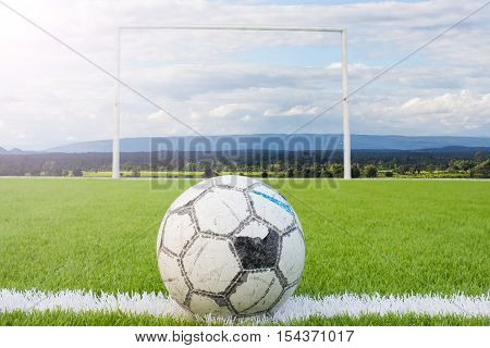 Soccer Ball On Artificial Turf Football Field Green White Grid With Sky Backgound