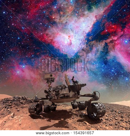 Curiosity rover exploring the surface of Mars. Elements of this image furnished by NASA.