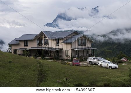 SABAH,BORNEO,Bundu Tuhan, Kundasang-August 29,2016: Cloudy sky scenery of Mount Kinabalu from Hounon Ridge Farmstay
