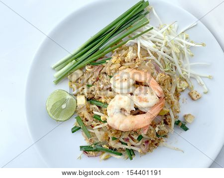 Pad Thai, Stir-fried Rice Noodles With Shrimp In White Dish On White Background. The One Of Thailand