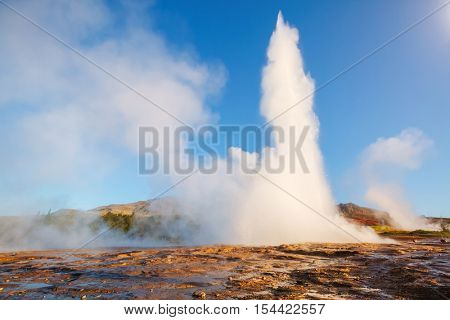 Great view of Strokkur geyser in morning light. Popular tourist attraction. Unusual and gorgeous scene. Location place Geyser Park, Hvita river, Haukadalur valley area, Iceland. Europe. Beauty world.