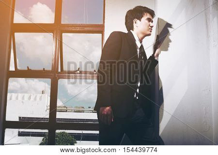 Portrait Of A Smiling Young Handsome Businessman