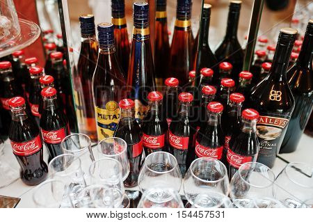 Hai, Ukraine - October 25, 2016: Coca Cola Bottle With Metaxa Cognac On Buffet Table