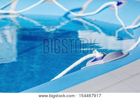 Above-ground inflatable swimming pool closeup in private pool
