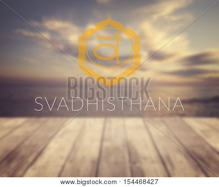 Svadhisthana chakra symbol. Poster for yoga class with a sea view.