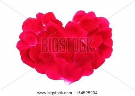 Red rose petals in heart shape isolated on white background