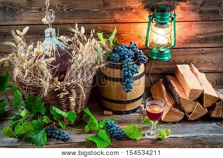 Tasting Red Wine Straight From The Demijohn