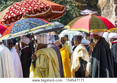 Gondar Ethiopia - January 19 2016: Orthodox priests attends the procession in the annual religious celebration of Timket (epiphany)