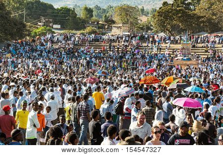 Gondar Ethiopia - January 19 2016: A crowd of local faithfuls attends the procession in the annual religious celebration of Timket (epiphany)