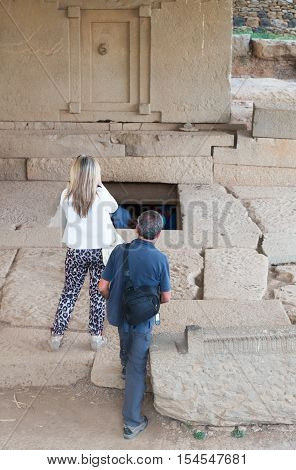 Ethiopia, Axum, tourists in the archeological site