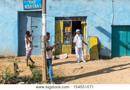 Adua Ethiopia - January 21 2016: Local paople in front of a store in the village.