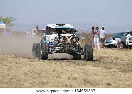 Speeding White Zarco Rally Car Front View