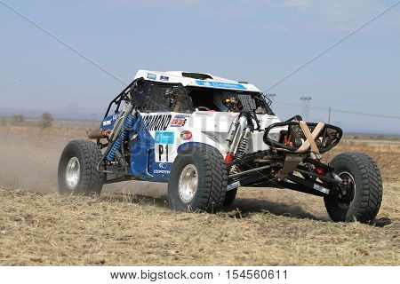 Forty Five Degree Close-up View Of Speeding White Zarco Rally Car