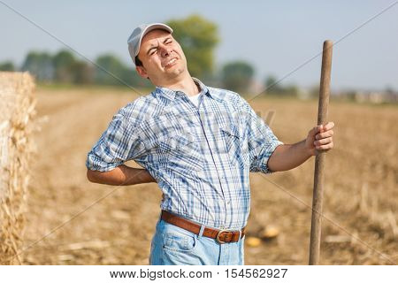 Farmer having back pain