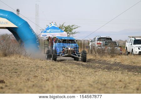 Speeding Blue Zarco Rally Car At Start Of Race
