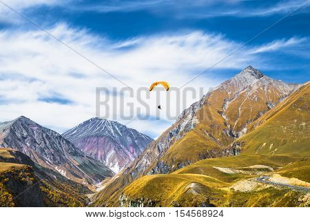 Paragliding over mountains of Gudauri.  Georgia. Europe.