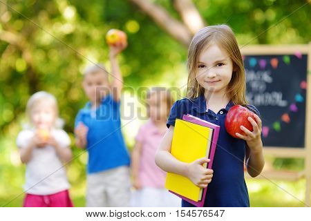 Excited Little Schoolgirl Going Back To School